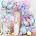 Pastel balloon arch set with iridescent butterflies and silver stars for party decor - Ice Blue Butterfly Theme
