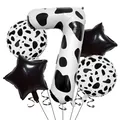 Vue détaillée du lot de ballons chiffre 7 imprimé vache noir et blanc avec étoiles - Nombre 7 (nn007)