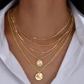 Conjunto de collares dorados de varias capas con colgantes de monedas en modelo - Collar / Estilo de Capas Placa Redonda Figaro (6609901HB)