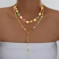 Conjunto de collares dorados dobles con gemas coloridas y perlas en la modelo - Estilo de Doble Capa en Y Piedras Coloridas Perla Dorado (6607801HB)