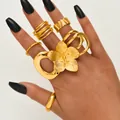 7-piece gold hollow irregular flower ring set for women in minimalist stylish stackable design - Multi-Piece Statement Large Flower Wide Textured Stacking Ring Set (6482902HB)
