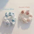 Elegant organza scrunchies in cream blue and sweet pink with delicate floral embroidery - Pink and Blue
