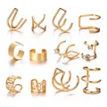 Detailed set of 12 gold ear cuffs featuring crossover and rhinestone designs - Full Design Set (5299901) / Gold