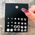 Set of 15 pairs of silver earrings with pearls and crystals for a trendy versatile look - Full Diamond Heart Geometric Silver Stud Set (EJ18425)