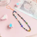 Detail of bohemian phone strap with colorful evil eye beads and clay discs - Colorful Evil Eye Polymer Clay Style (82836)