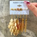 6-piece gold hoop earring set with pearls and leaf charms on fashion display card - Sequin Leaf Tassel Gold Drop Set (F440)