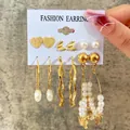 Set of 6 gold-plated butterfly and faux pearl earrings displayed on a fashion card - Heart Butterfly Pearl Gold Drop Earring Set (5244303)