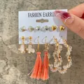 6-pair set of gold and silver earrings with pearls, stars, and tassels on a display card - Star Moon Flower Tassel Colorful Earring Set (51803)