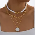 Conjunto de collares dorados con colgantes de concha estrella de mar y cuentas blancas - Estrella de Mar Concha Elementos Marinos Dorado Cuatro Capas (6511801HB)