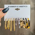 6-piece set of gold hoop earrings with marble and tortoise resin accents on display card - Marble Tortoiseshell Multi-piece Set (5434051)