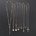 Set de 9 collares de moda con colgantes de corazón y cruz en oro y acabado plata - Juego de 9 Collares de Estilos Mixtos de Moda (6583001HB)