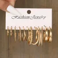 Set of 6 pairs gold-colored geometric C-shaped earrings with varied textures - Polished Twist Texture Gold Hoop Combo (5742401HB)