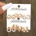 Set of 6 gold-tone geometric alloy earrings with faux pearls and rhinestones on card - Hollow Concentric Moon Petal Gold Earring Set (5719301)