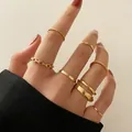 7-piece gold knuckle ring set with minimalist thin bands and twisted chain designs - Gold Chain Rope Geometric Ring 7-Piece Set (5202001) / Gold
