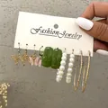 Vintage 5-piece earring set featuring gold butterfly charms and green resin drops - Butterfly Flower Romance Assortment (54679)