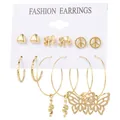 Vintage gold earring set featuring heart, butterfly and animal charms on a card - Bohemian Totem Collection (54353)