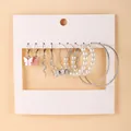 Set of 6 pairs of silver earrings featuring pink butterfly, snake, and pearl charms - Dreamy Butterfly Fantasy Collection (5367425)