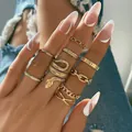 Bohemian style 10-piece gold ring set with snake and chain motifs for women - Golden Snake Chain Layering Collection (5463401)