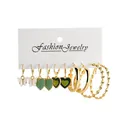 5-piece gold earring set with white butterfly and green heart pendants on card - Green Heartbeat Voice Assortment (54812)