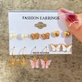 Set of 6 acrylic butterfly earrings and pink crystal studs on a white display card - Butterfly Heart Pearl Pink Gold Earring Set (53676)