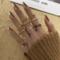 11-piece vintage gold chain ring set with zircon and black drop gems on female hand - Vintage Black Gemstone Rhinestone Stackable Ring Set (5460601) / 11 Pack / Gold