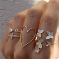9-teiliges goldenes Bohemian-Ring-Set mit Schmetterlings- und Herz-Anhängern - Schmetterling Herz Kreuz Set (55338)