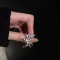 Creative butterfly fluid metal ring set with polished silver finish on model hand - Liquid Metal Butterfly Wing Style - Silver