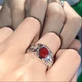 Silver-toned fluid open ring featuring a central red stone and zircon accents - Retro Ruby Irregular Style - Silver