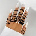 24-piece set of black gothic rings featuring hollow hearts, chains, and faux pearls - Black Hollow Butterfly Heart Style (5591903) / Black