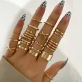 9-piece gold-toned butterfly and pearl knuckle ring set featuring layered alloy bands - Minimalist Cross Chain Spiral Ring Set (5598803HB) / Gold