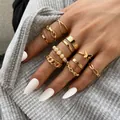 22-piece gothic gold ring set featuring heart, butterfly, and pearl accents on fingers - Butterfly Artificial Pearl Wide Band Ring Set (53594) / 10 Pieces Pack / Gold
