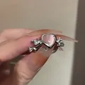 Adjustable silver ring featuring a pink heart-shaped stone and side zircon accents - Pink Heart Starburst Sweet Style - Silver