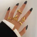 Five-piece golden snake ring set with scale texture and green zircon eyes on hand - Gold Gothic Snake Individual Style (5540101) / Gold