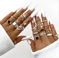 22-piece silver ring set featuring butterfly, heart, and snake designs on hands - Silver Black Heart Butterfly Geometric Style (5645302HB) / 20 Pieces Set / Silver