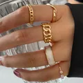Five-piece gold ring set featuring chains, pearls, and minimalist wave bands for women - Pearl Enamel Chain 5-Piece Set (5379403) / Gold