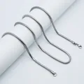 Detailed view of silver stainless steel snake chain with durable lobster clasp closure - Standard Short / Steel