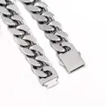 Close-up of polished silver stainless steel Cuban link necklace with rectangular buckle - 13mm x 46cm / Steel