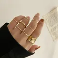 8-piece set of golden minimalist rings featuring twisted bands and a statement wavy ring - One Size / Gold Minimalist Wave Irregular 8-Piece Set (52620)