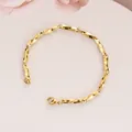 Detailed close-up of golden Mobius link chain bracelet with secure lobster clasp finish - 3*19CM / Gold