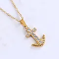 Macro detail of gold anchor cross pendant with sparkling white cubic zirconia stones - Anchor Cross (N0033)
