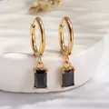 Detail of 18K gold-plated hoop earrings with rectangular black zircon stone pendants - Black Zirconia
