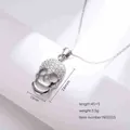 Icy silver skull pendant necklace with micro-pave cubic zirconia on a minimalist chain - Steel Color (N0161S)