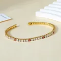 Detail of 3mm gold-plated tennis bracelet with red and white cubic zirconia stones - Gold Color (White & Red Zirconia)