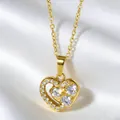 Elegant 18K gold hollow heart necklace with sparkling zircon pavé on white silk - 3-Stone Nested Luxury Style (N0115)