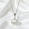 Silver spade pendant necklace with pavé cubic zirconia on soft white silk background - Silver Inlaid Spade Style (N0116S)
