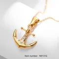 Gold plated anchor pendant necklace featuring three micro-set cubic zirconia on cross chain - Gold (N0131G)