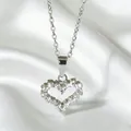 Silver 18K gold heart pendant necklace with shimmering zircon stones on silk background - Silver Full Pave Heart (N0082S)