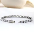 Macro detail of 316L stainless steel tennis bracelet with oval cubic zirconia stones - Steel / 17cm