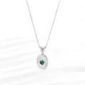 Macro view of a 18K silver-plated necklace featuring a green gemstone pendant - Oval Silver