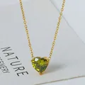 Macro shot of gold necklace featuring a heart-cut olive green zircon pendant with claw setting - 18K Gold (Olive Green Cubic Zirconia) (N0124G-4)